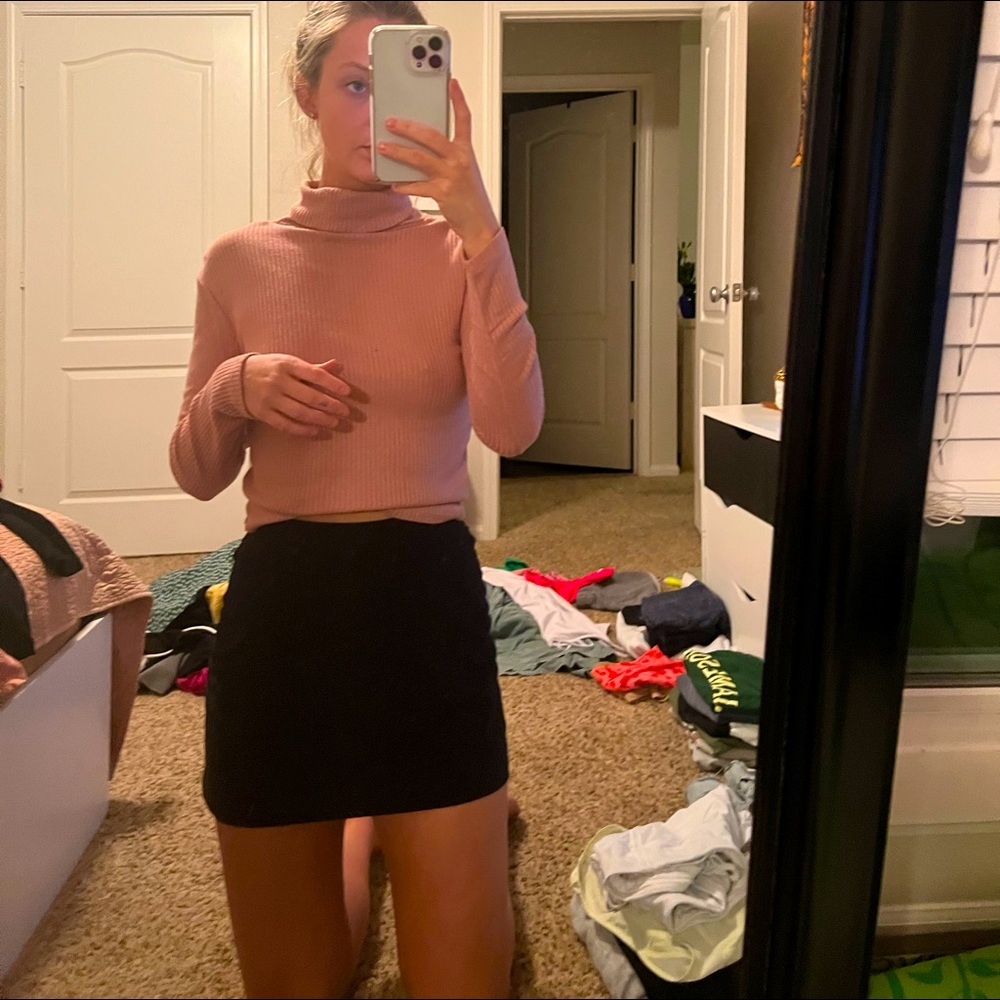pink turtleneck